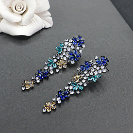 Серьги-гвоздики с цветком из латуни и кубическим цирконием