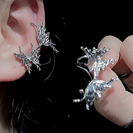 Silver Butterfly Ear Cuff Earrings - Minimalist Metal, Cool Tone, Wing-inspired.