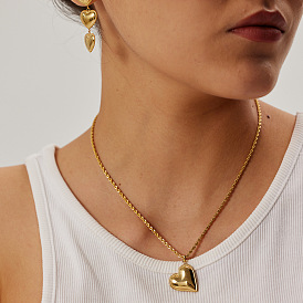 Gold-plated Stainless Steel Heart Tassel Earrings with Titanium Steel Ear Studs.