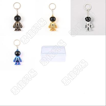 4pcs 4 couleurs porte-clés astronautes en plastique, électrolytique, avec les principaux anneaux de fer