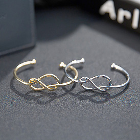 Minimalist Metal Knot 8-shaped Open Gold-plated Bracelet - Simple, Exaggerated, Women's Hand Ornament.