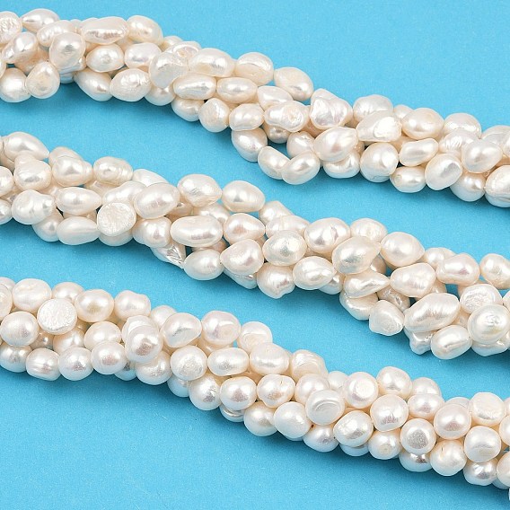 Нити из натурального культивированного пресноводного жемчуга, двух сторон полированной