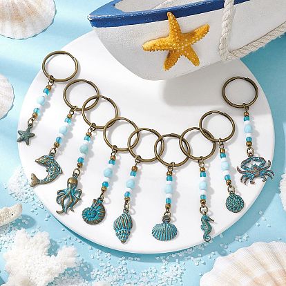 Сплав брелки с подвеской на тему океана, со стеклянными бусинами, латунными соединительными кольцами, натуральными бусинами из говлита, никелированными разъемными кольцами с железным покрытием и железной булавкой с ушком, разнообразные