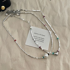 Délicat collier de perles en argent au design élégant - à la mode et unique