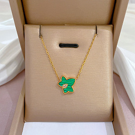 Delicate Gold Necklace with Green Maple Leaf Pendant - Elegant, Lockbone Chain Accessory.