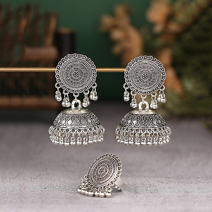 Комплект из плоских круглых и колокольчатых сережек-гвоздиков и колец в этническом стиле из сплава