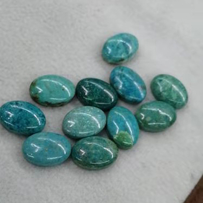Teints cabochons turquoises synthétiques, ovale