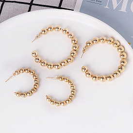 Pendientes circulares de perlas chapados en oro simples y elegantes: moda europea y americana