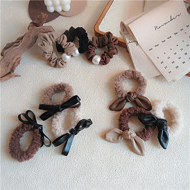 Cute versatile autumn and winter furry hair tie with PU leather butterfly bow rabbit ear elastic large intestine hair circle pearl female.