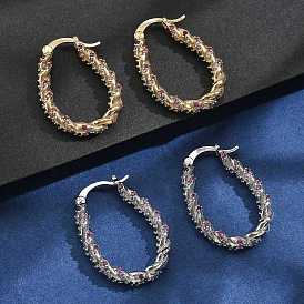 Женские серьги-кольца из латуни с микропаве и кубическим цирконием, скрутка с овалом