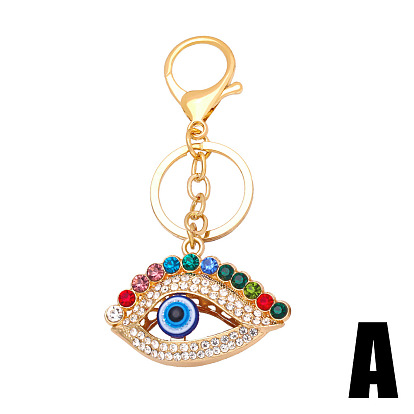 Colored rhinestone devil's eye metal keychain pendant creative small gift bag pendant kca36