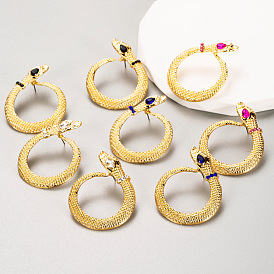 Sparkling Serpent Earrings: Bold Alloy Studs with Dazzling Gems for Women