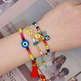 Boho Crystal Tassel Bracelet with Evil Eye Charm and Friendship Cord