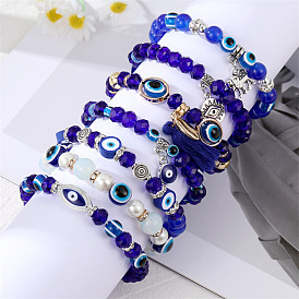 Unique Pearl Bracelet with Devil Eye Charm and Fashionable Tassel Pendant