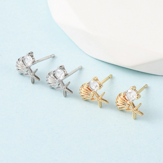 Серьги-гвоздики из латуни с микропаве из прозрачных кубических цирконий в форме морской звезды и ракушки