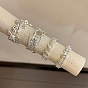 Латунные кольца-манжеты с микропаве из прозрачных кубических цирконий, платина