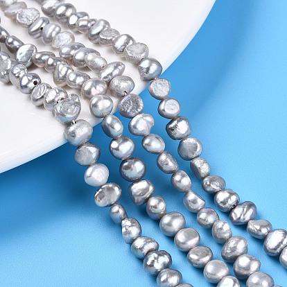 Нити из натурального культивированного пресноводного жемчуга, двух сторон полированной, окрашенные