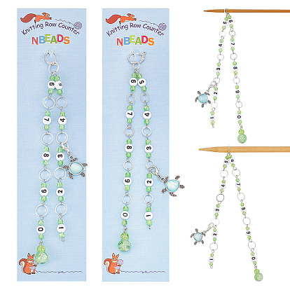 Окрашенное распылением кракелюрное стекло и акриловые звенья, вязальные цепочки со счетчиками рядов, латунное связующее кольцо, маркер для запирания петель, шкентеля сплава с стразами, черепаха