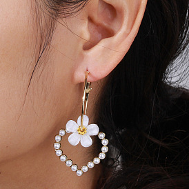 Fashionable European and American floral earrings with sweet heart-shaped pearl ornaments.