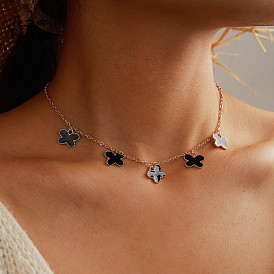 Minimalist Black Oil Drop Flower Necklace with Fashionable Leaf Pendant