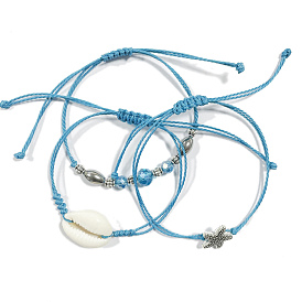 Natürliche Kaurimuschel geflochtene Perlenarmbänder für Mädchenfrauen, Armbänder aus Seesternlegierung, Armbänder aus Glas- und Legierungsperlen