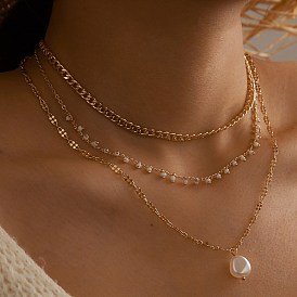 Collier chic à trois couches avec pampilles de perles pour un look minimaliste tendance