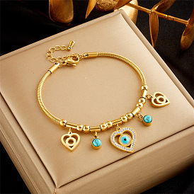 Ensemble collier et bracelet avec pendentif en forme d'oeil bleu, cœur creux chic, en acier et titane, bijoux en métal