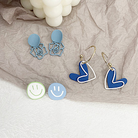 Temperament light blue hollow rose silver needle earrings simple and sweet smiling face without pierced ear clips hit color love earrings female