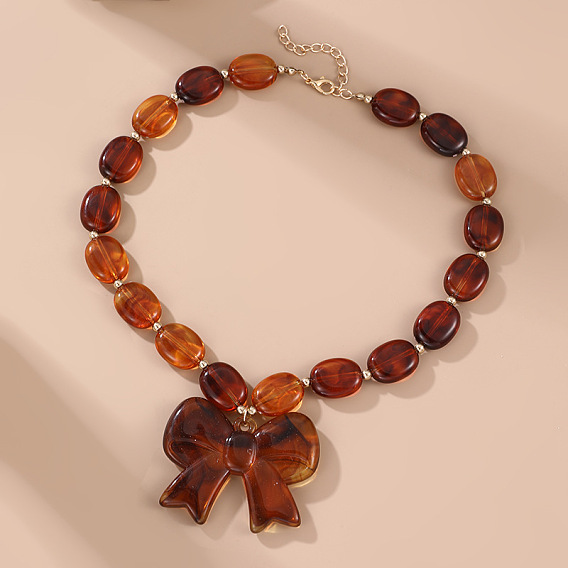 Овальные бусы из бисера с подвеской в виде бантика из смолы и цепочками из сплава для женщин., золотые