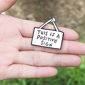 Positive Sign Oil Pin: A Symbol of Hope and Optimism