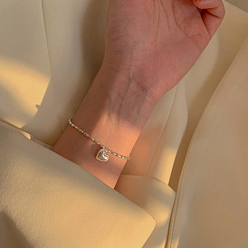 Minimalist Heart-Shaped Pendant Bracelet for Women with Unique Design and Cold Tone