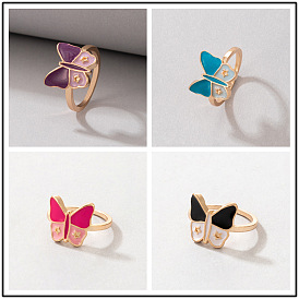 Minimalist Oil Drop Butterfly Pentagram Ring with Playful Color Contrast