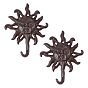 Gancho de pared rústico de hierro fundido con forma de cara de sol., gancho decorativo para abrigos, teclas, toallas