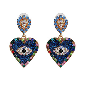 Chic Heart-shaped Earrings with Gemstone Eyes and Diamond Accents