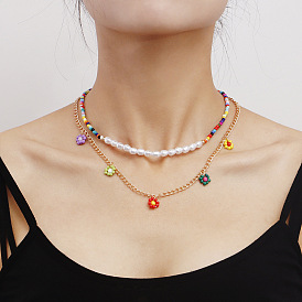 Collier de perles de fleurs de marguerite fait à la main pour femmes avec des perles de riz colorées