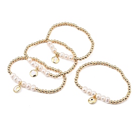 Estirar las pulseras del encanto, con cuentas de perlas naturales, cuentas de latón y dijes de latón esmaltado, plano y redondo