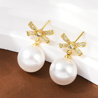 Серьги-гвоздики с бантом из латуни с микропаве из прозрачных кубических цирконий, с абс пластмассовой имитационной жемчужиной, стойки покрытие, долговечный, без свинца и без кадмия
