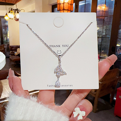 Fashionable Butterfly Water Drop Tassel Necklace for Women, Unique Design Clavicle Chain with a Sense of Style.