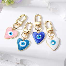 Creative Devil's Eye Pendant with Flowing Sand and Heart-shaped Metal Keychain