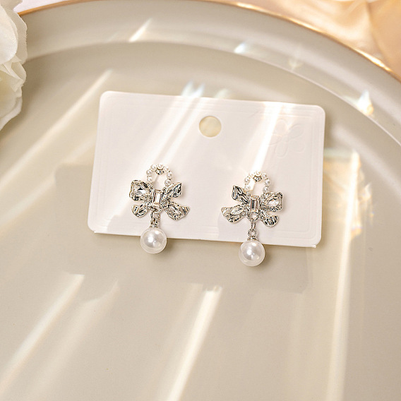 Женские серьги-гвоздики из сплава со стразами, бантом