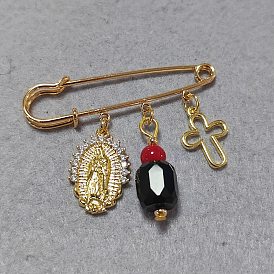 Broches de hierro, con colgantes de latón y vidrio, cruz y oval