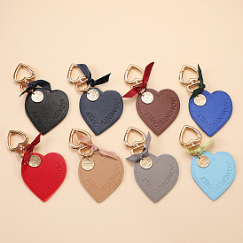 Heart-shaped leather keychain for car, couples, backpacks and bags.