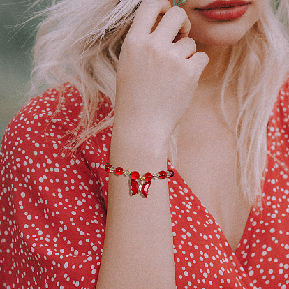 Glass bracelet with butterfly pendant - minimalist design, elegant accessory.
