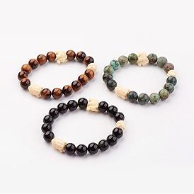 Perles de pierres précieuses naturelles s'étendent bracelets, de corail synthétique