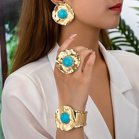 Комплект из цветочного сплава с синтетической бирюзой, серьги-гвоздики, кольцо и браслеты-манжеты