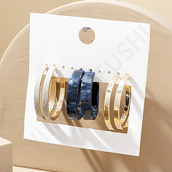 A pair of earrings Minimalist Circle Earrings with Shiny Metal Clasp for Fashionable Look