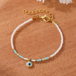 A white and green bead with a gold pendant. Colorful Pearl Flower Bracelet with Unique Design and Handmade Beads