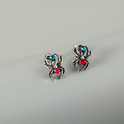 Holding Blue Diamond Red-bellied Silver Spider Earrings Halloween Spider Earrings with Colorful Rhinestones - Vintage Spider Ear Studs, Christmas Jewelry.