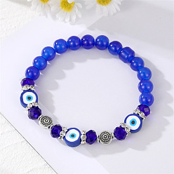 Blue mixed bead bracelet. Unique Pearl Bracelet with Devil Eye Charm and Fashionable Tassel Pendant