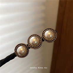 1# retro style Elegant Retro Bun Maker with Pearl Hair Tie for Chic Hairstyles